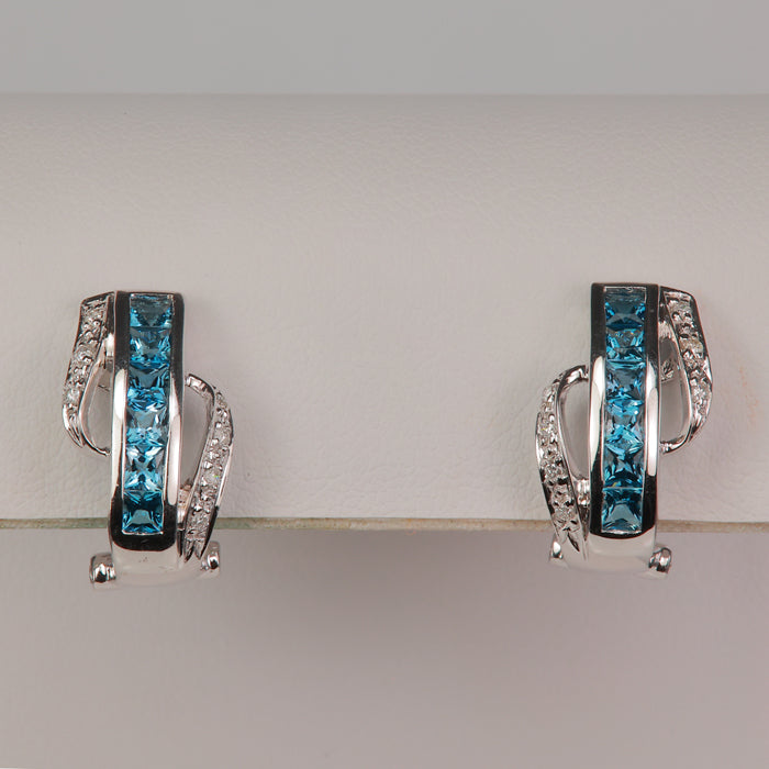white gold blue topaz and diamond lever back earrings 