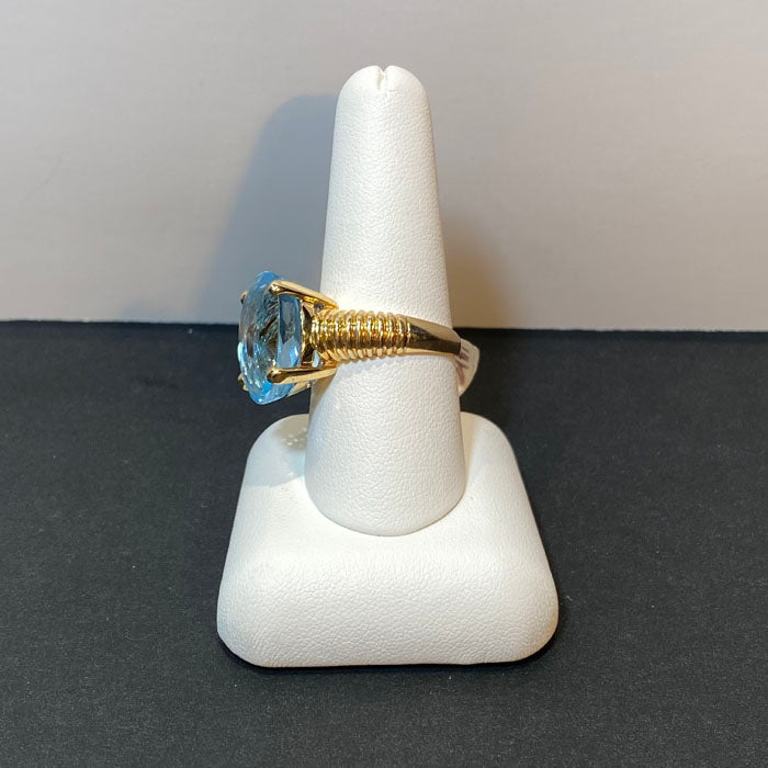 blue topaz yellow gold ring