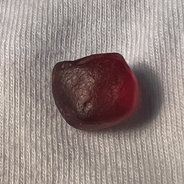 rough brown red garnet gem
