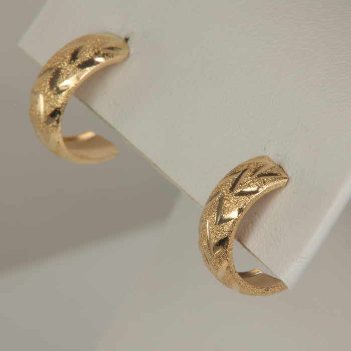 yellow gold chevron style diamond cut earrings