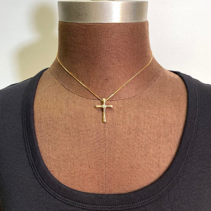yellow gold cross with diamond