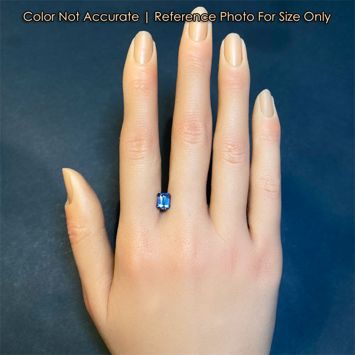 sapphire gemstone on hand 