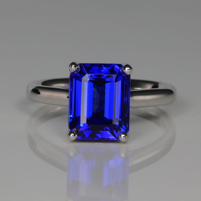white gold blue violet emerald cut tanzanite gemstone ring