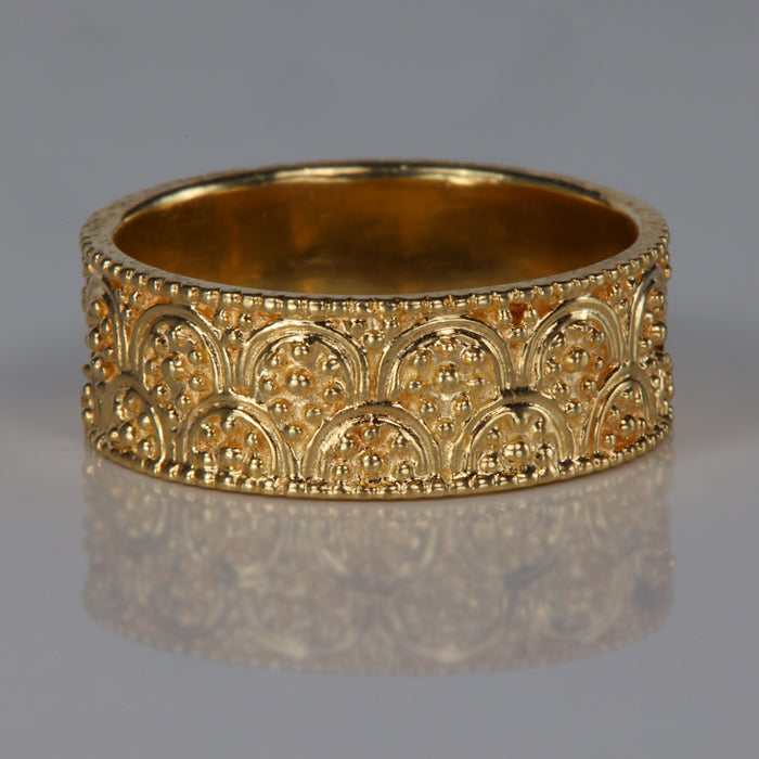 gold ring with bead detail and arches