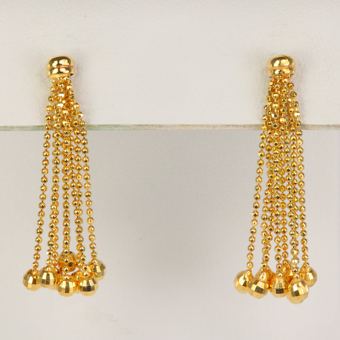 yellow gold dangle earrings with faceted gold balls