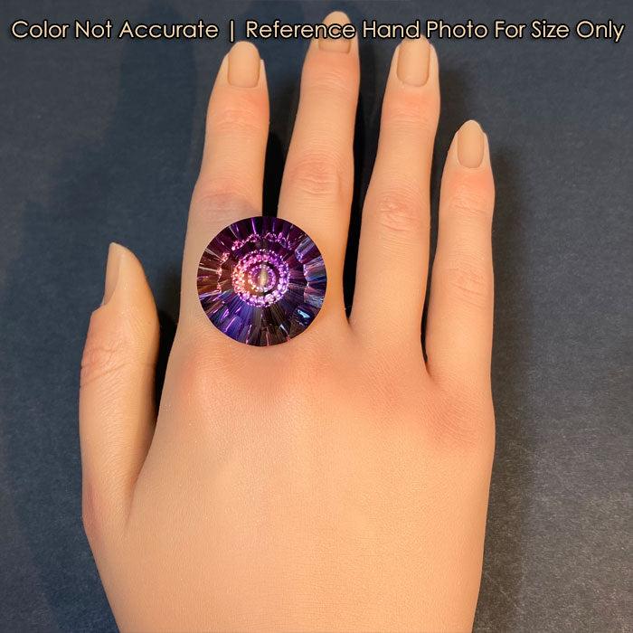 purple golden yellow ametrine gem on hand