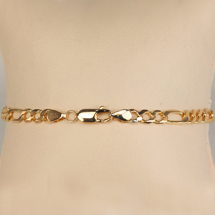 gold bracelet with figaro style link