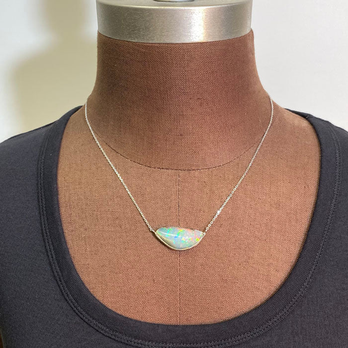 freeform opal pendant in white gold