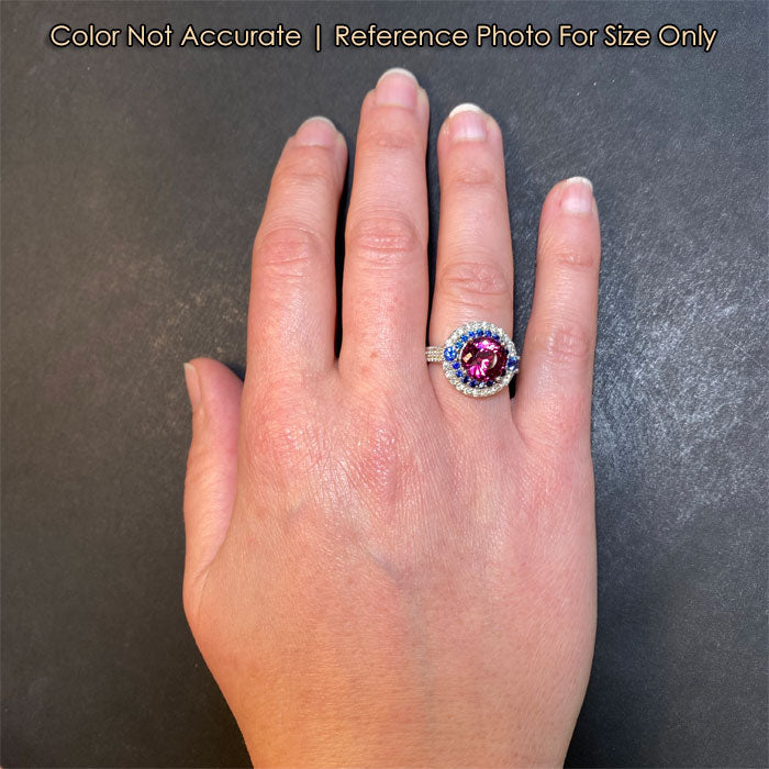 white gold garnet ring with diamond and sapphire