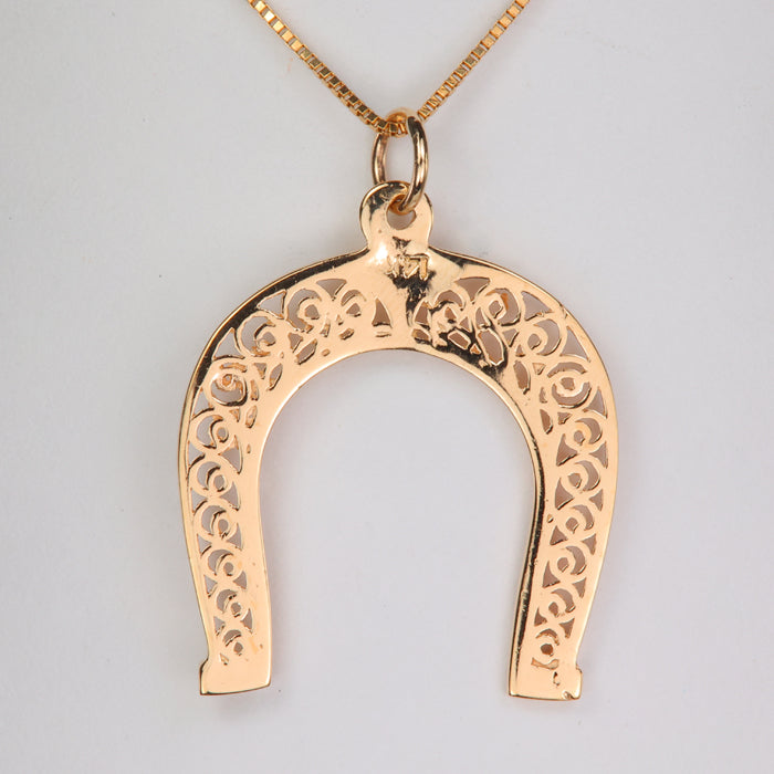 yellow gold horseshoe pendant with filigree