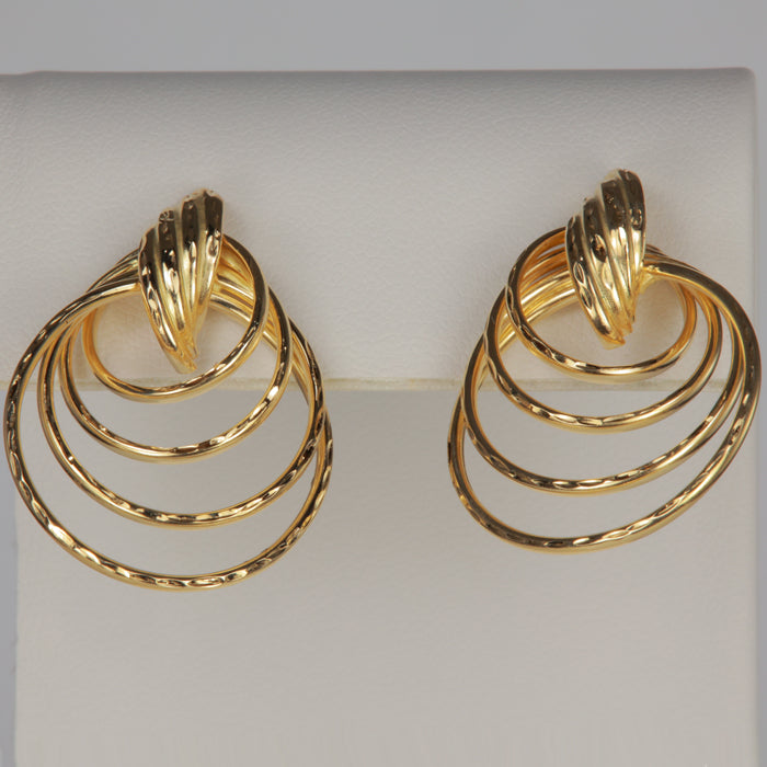 yellow gold swirl loop studs 