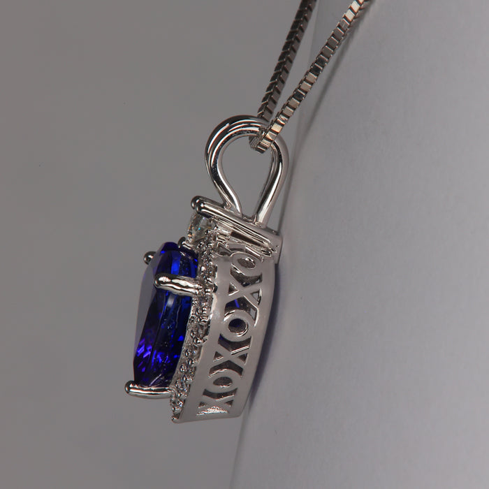 xoxoxoxo tanzanite gemstone and white gold pendant with diamonds