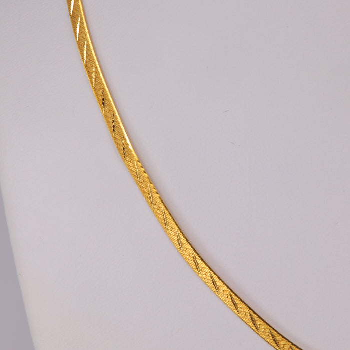 herringbone and diamond cut chain yellow gold