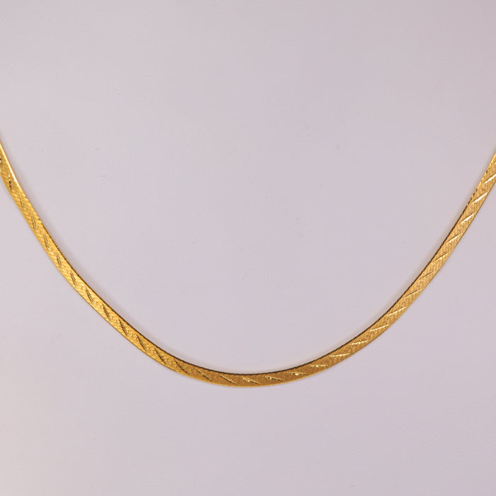 yellow gold diamond cut accent in herringbone