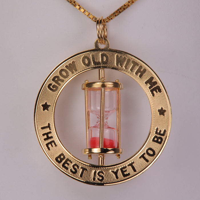 estate pendant in yellow gold with working hourglass grow old with me the best is yet to be