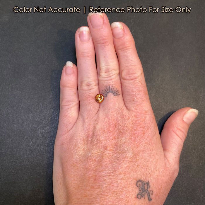 round imperial zircon gem on hand

