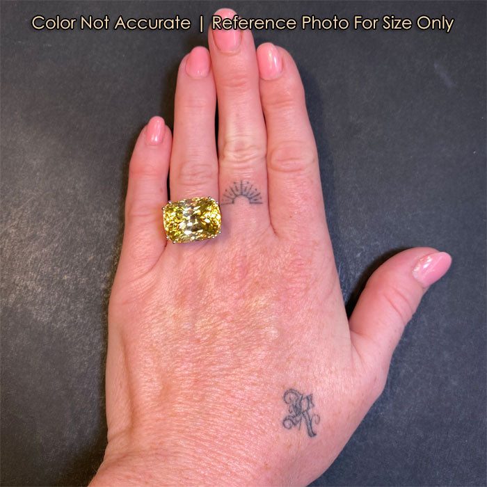white gold large scapolite ring to hand
