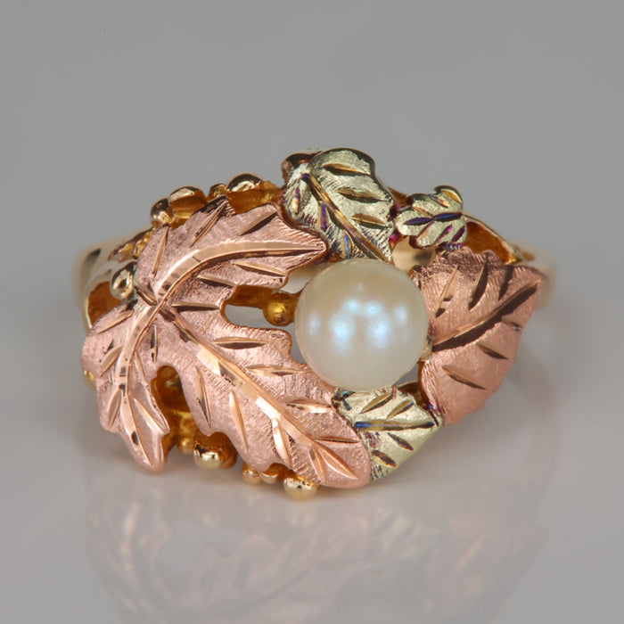 yellow and rose gold leaf ring with pearl accent