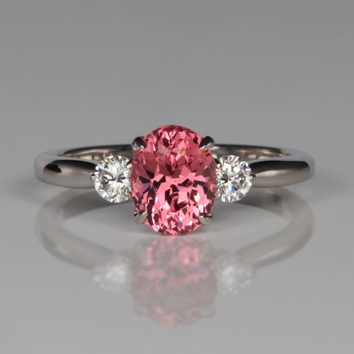 white gold ring with mahenge pink garnet gemstone and diamond accents
