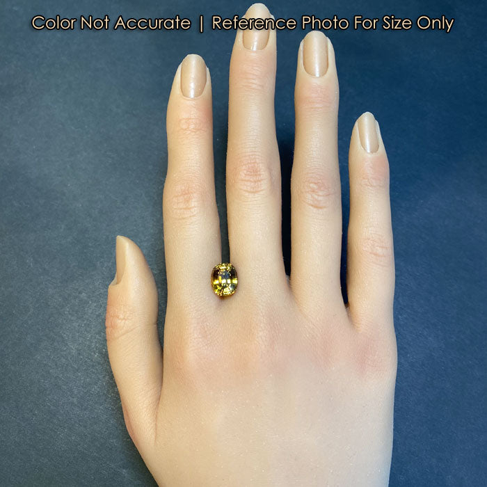 oval cut mali garnet gem on hand