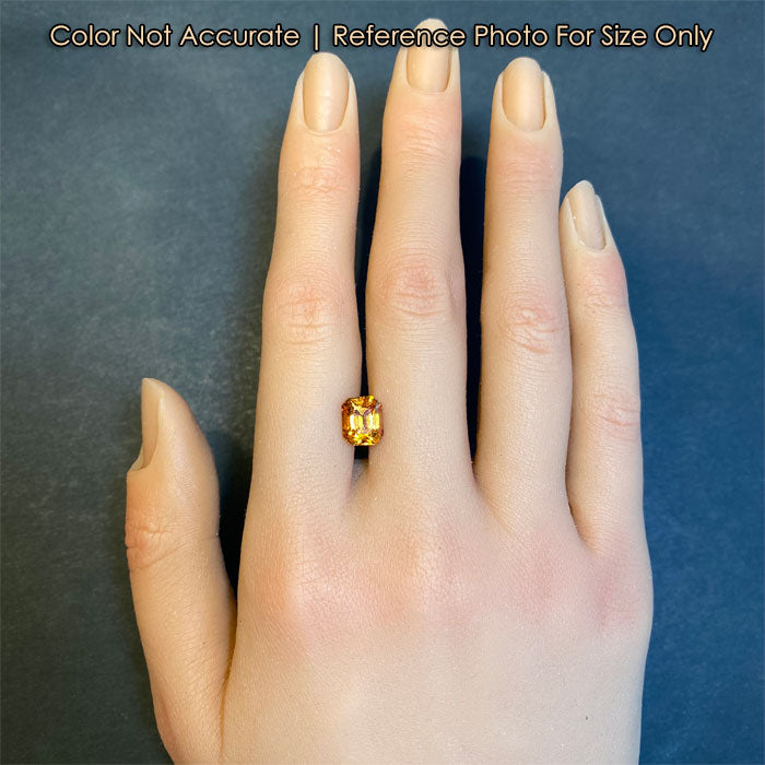 orange garnet gemstone size to a hand