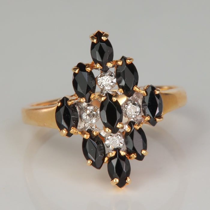 yellow gold marquise cut sapphire and diamond ring