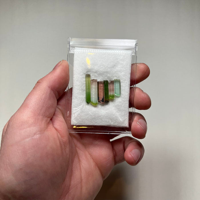tourmaline crystals in hand size