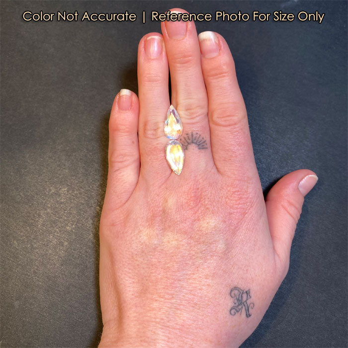 pair of moonstones on hand size reference
