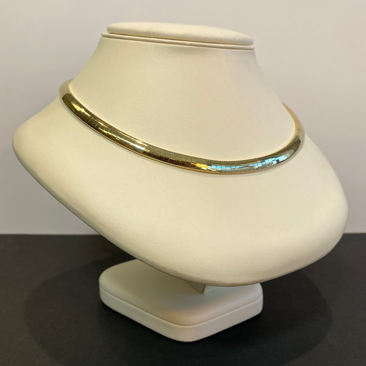 omega necklace yellow gold