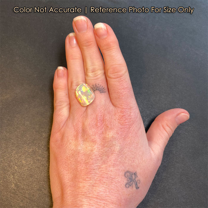 opal gemstone on hand size freeform