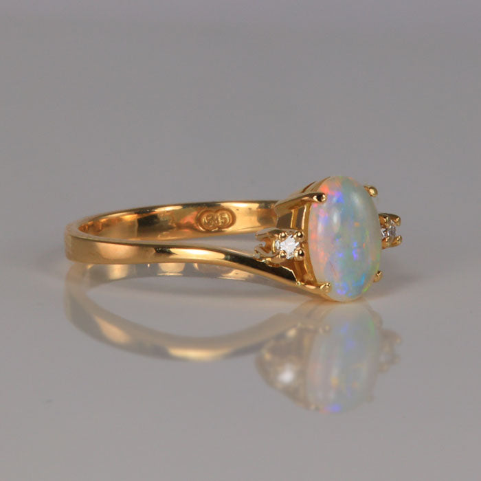 yellow gold opal ring with diamonds