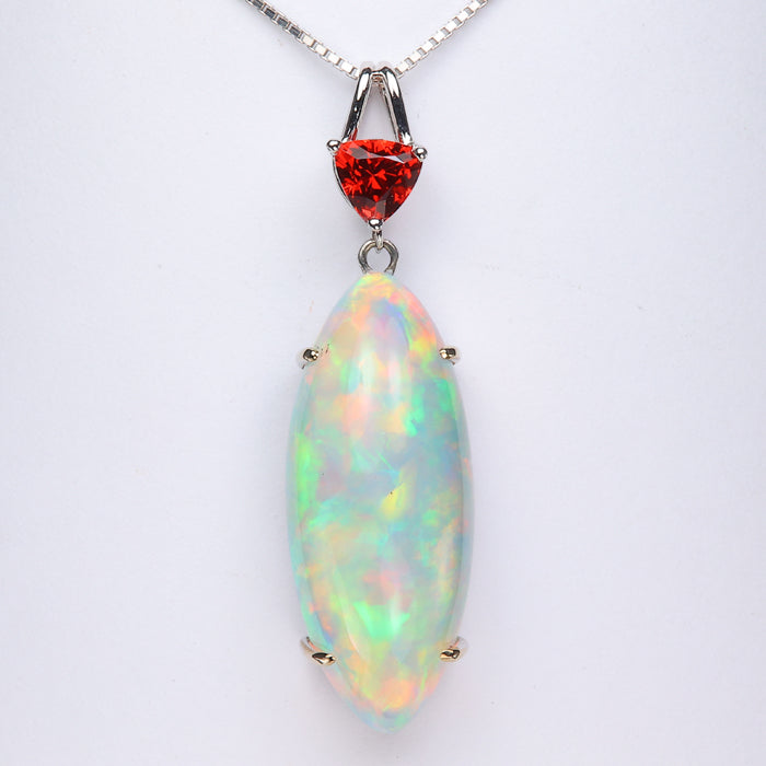 white gold opal and spinel gemstone pendant