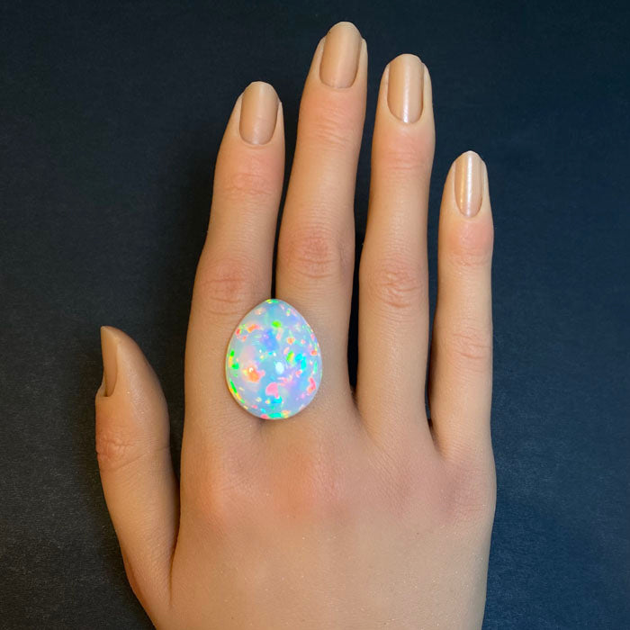 large pear opal rainbow color gem ethiopia