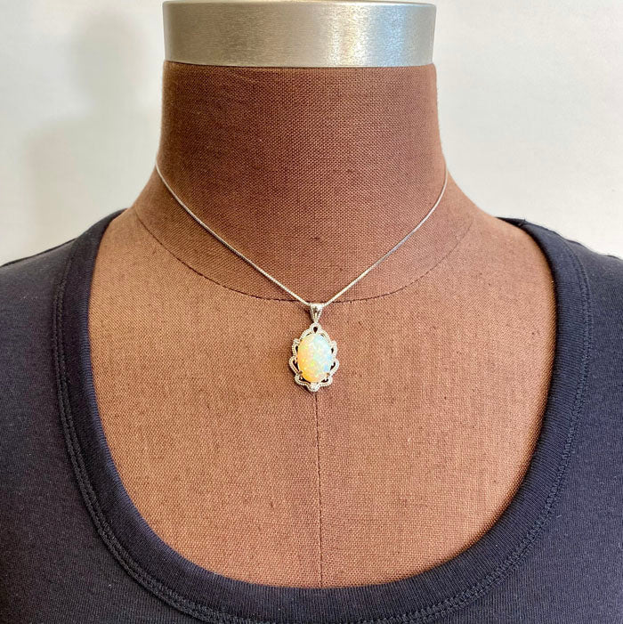 white gold opal diamond pendant