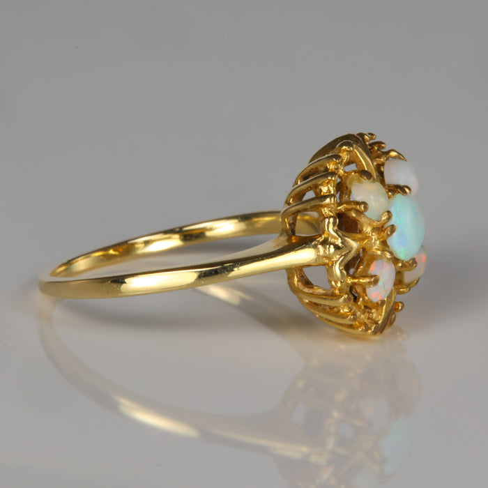 yellow gold estate ring with opal accents