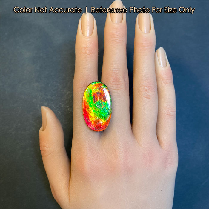ammolite gem size to a hand oval cut