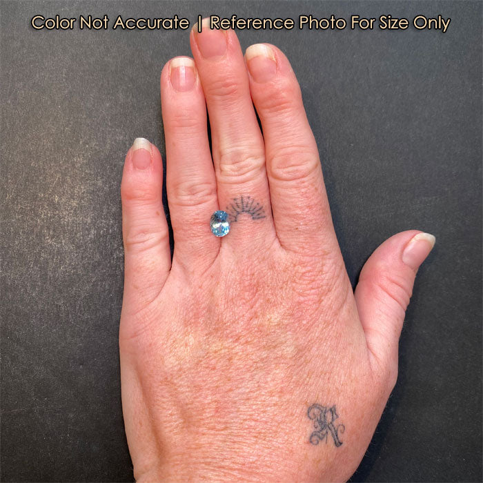 oval cut light blue aquamarine on hand