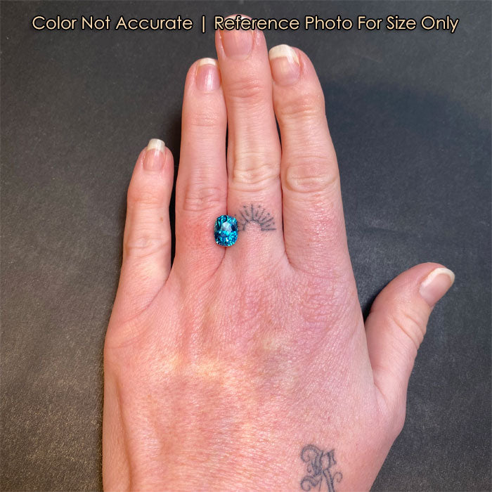 size of oval cut zircon gem on hand