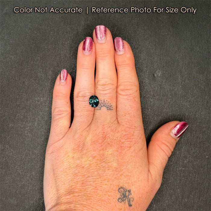 sapphire on hand green blue color