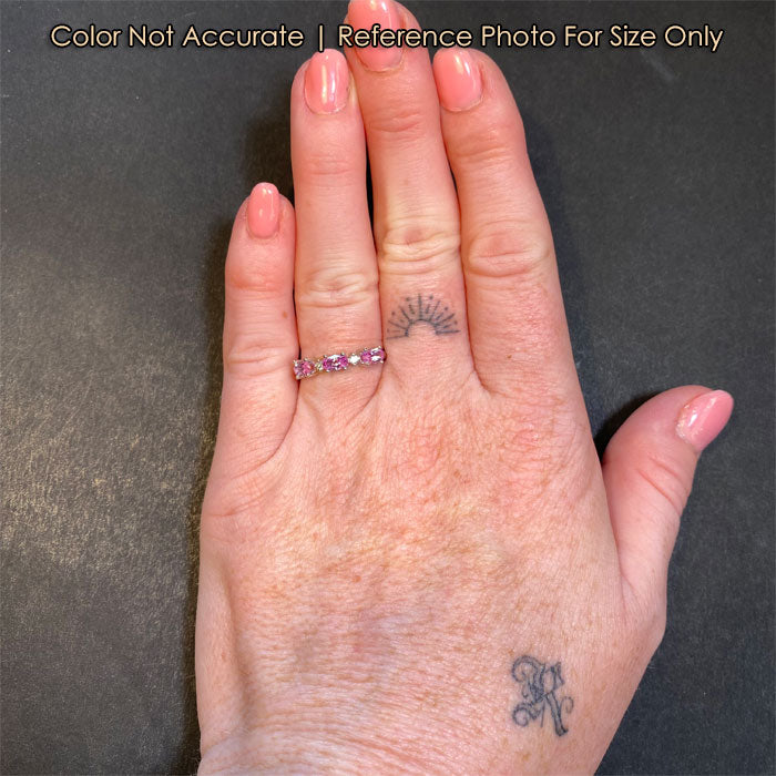 diamond and sapphire white gold ring on hand