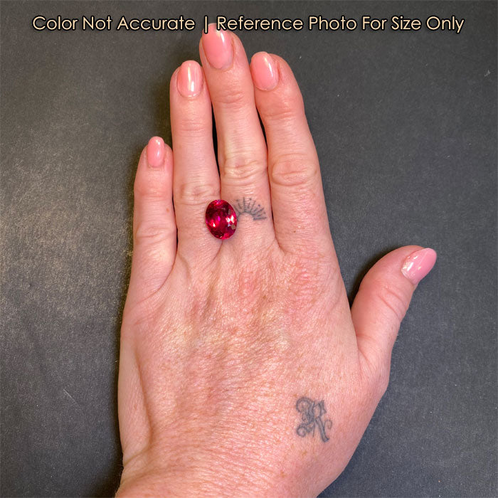 violet red rubellite tourmaline gemstone on hand 