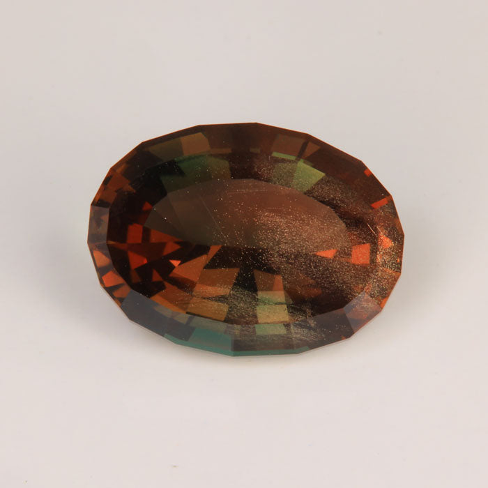 oval cut sunstone gemstone green red