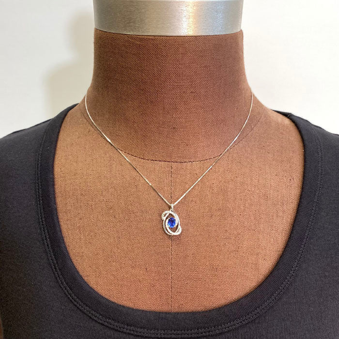 oval cut sapphire and diamond pendant white gold