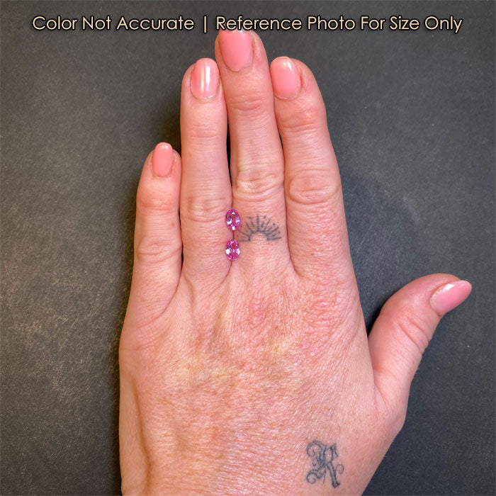 size of oval sapphire pair on a hand