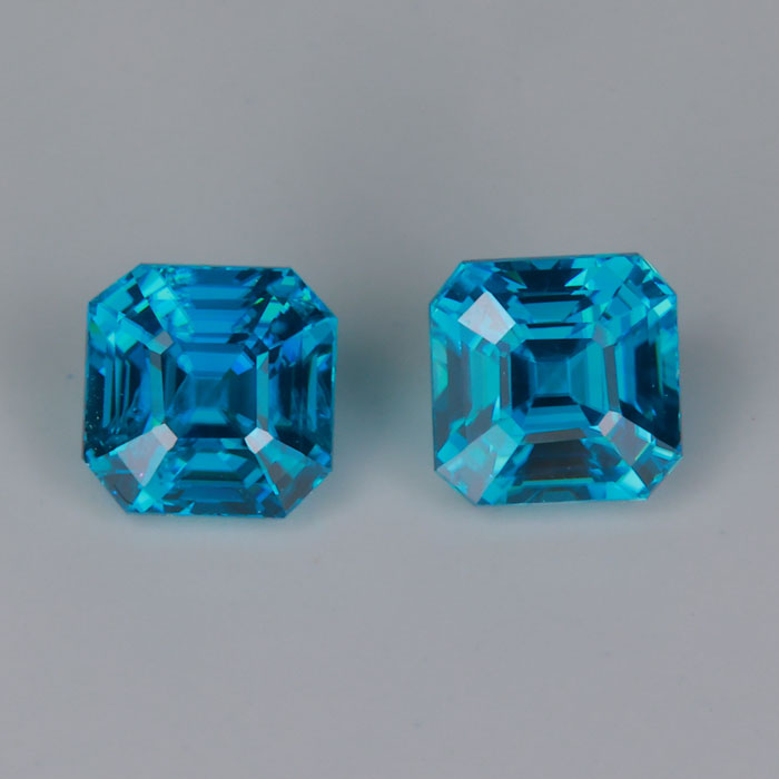 greenish blue zircon gemstones pair