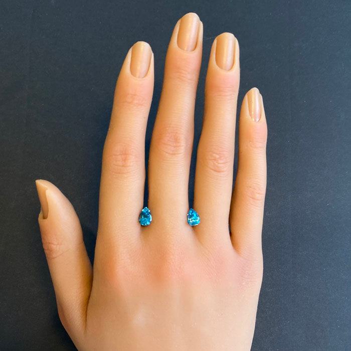 pear shape zircon gems greenish blue
