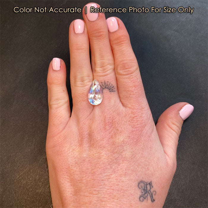 rainbow moonstone gem on hand pear shape