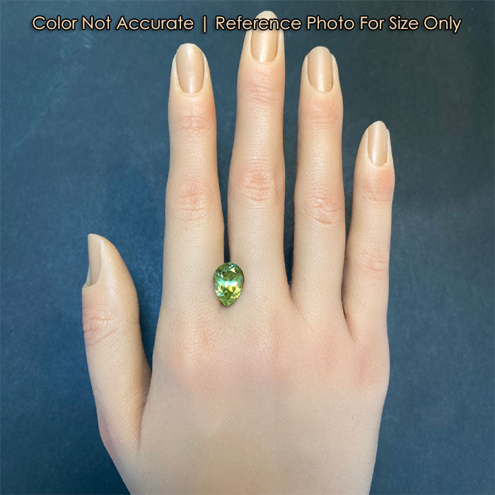 green color pear shape sphene size on hand