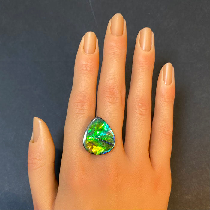 pear shape cabochon cut ammolite gem