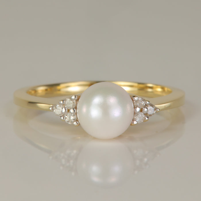 yellow gold pearl ring with diamonds 
